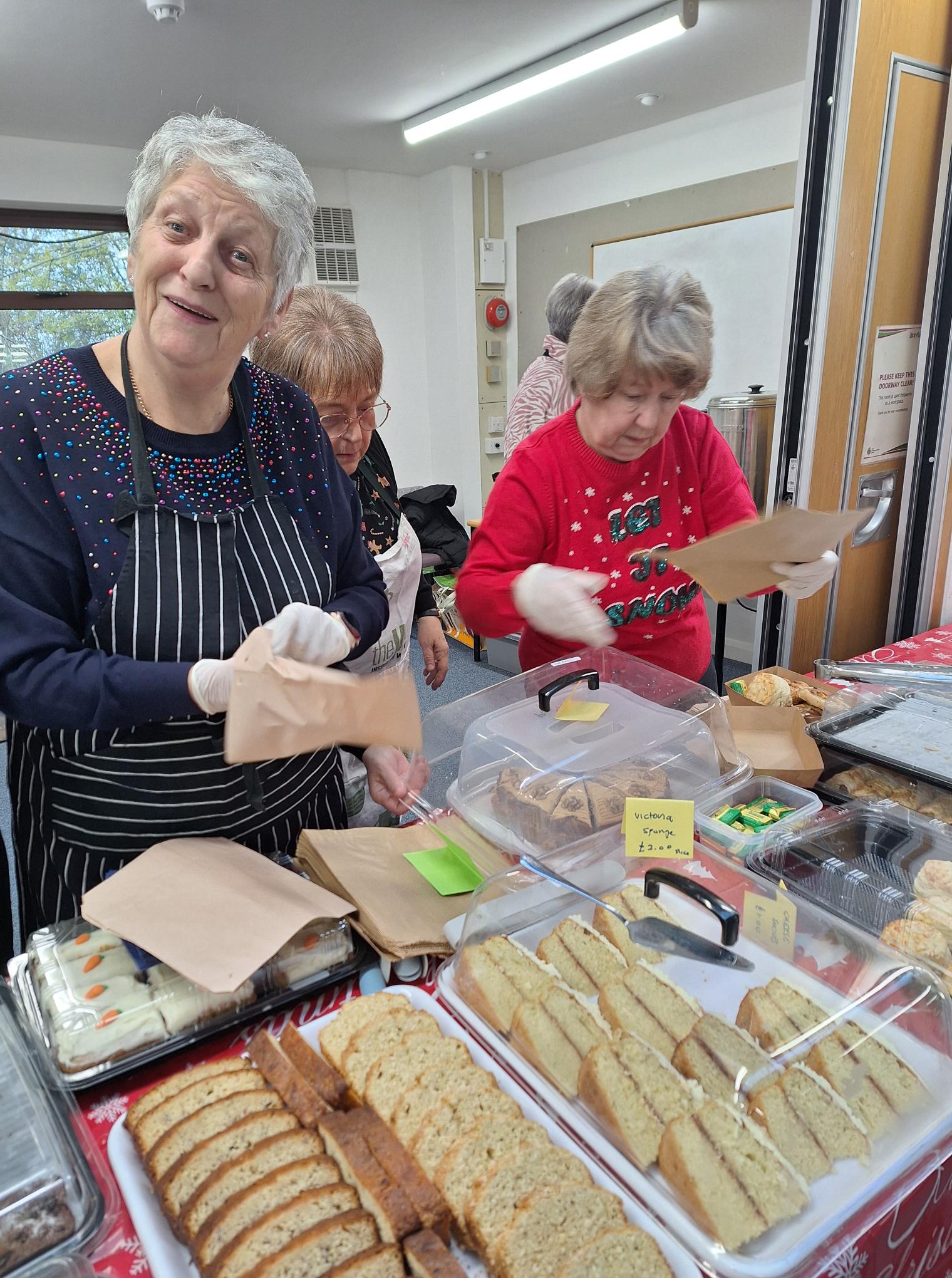 Carol, Ann and Lynne serving