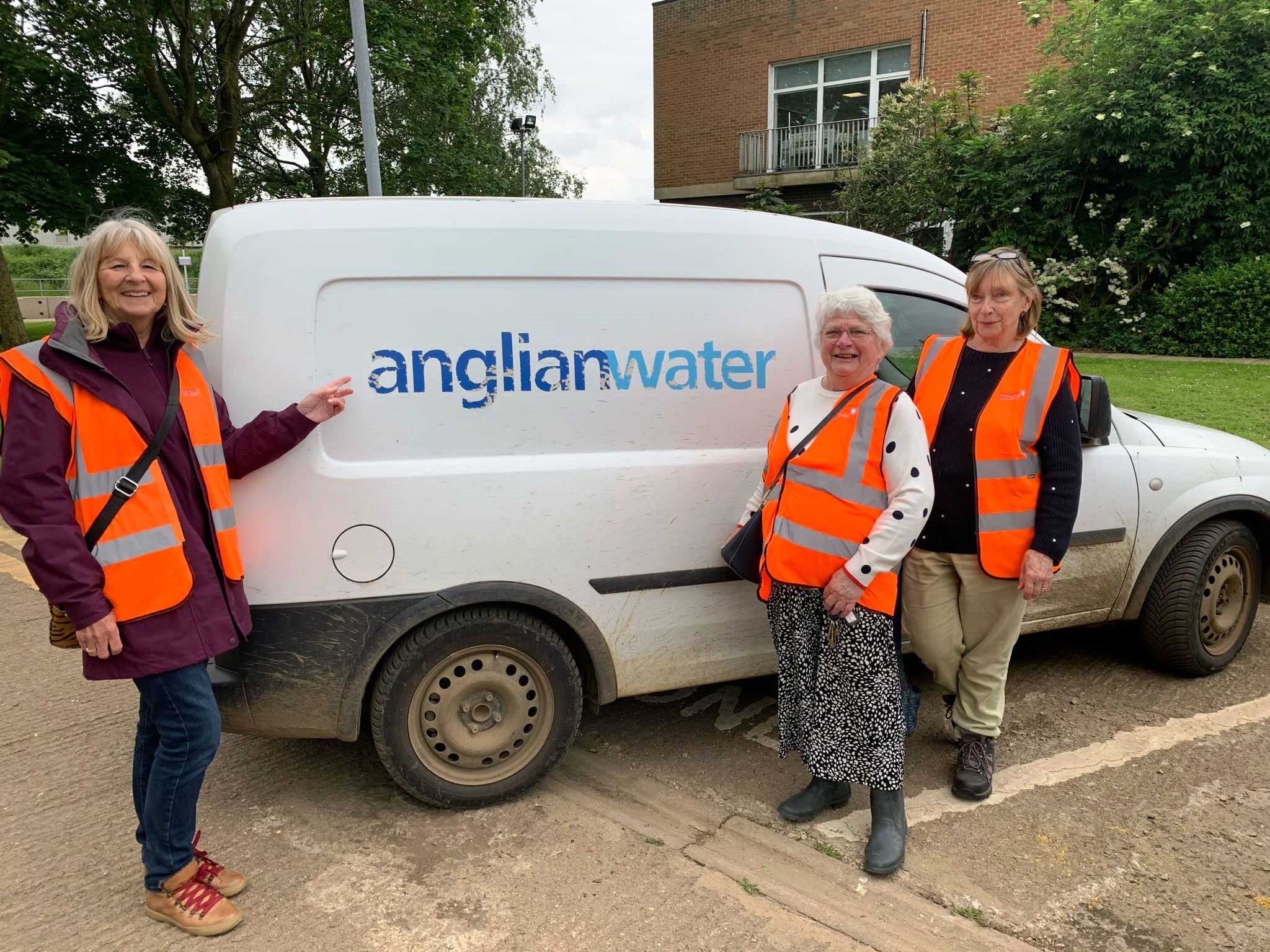 24.05 Three Weston Favell members by Anglian Water van